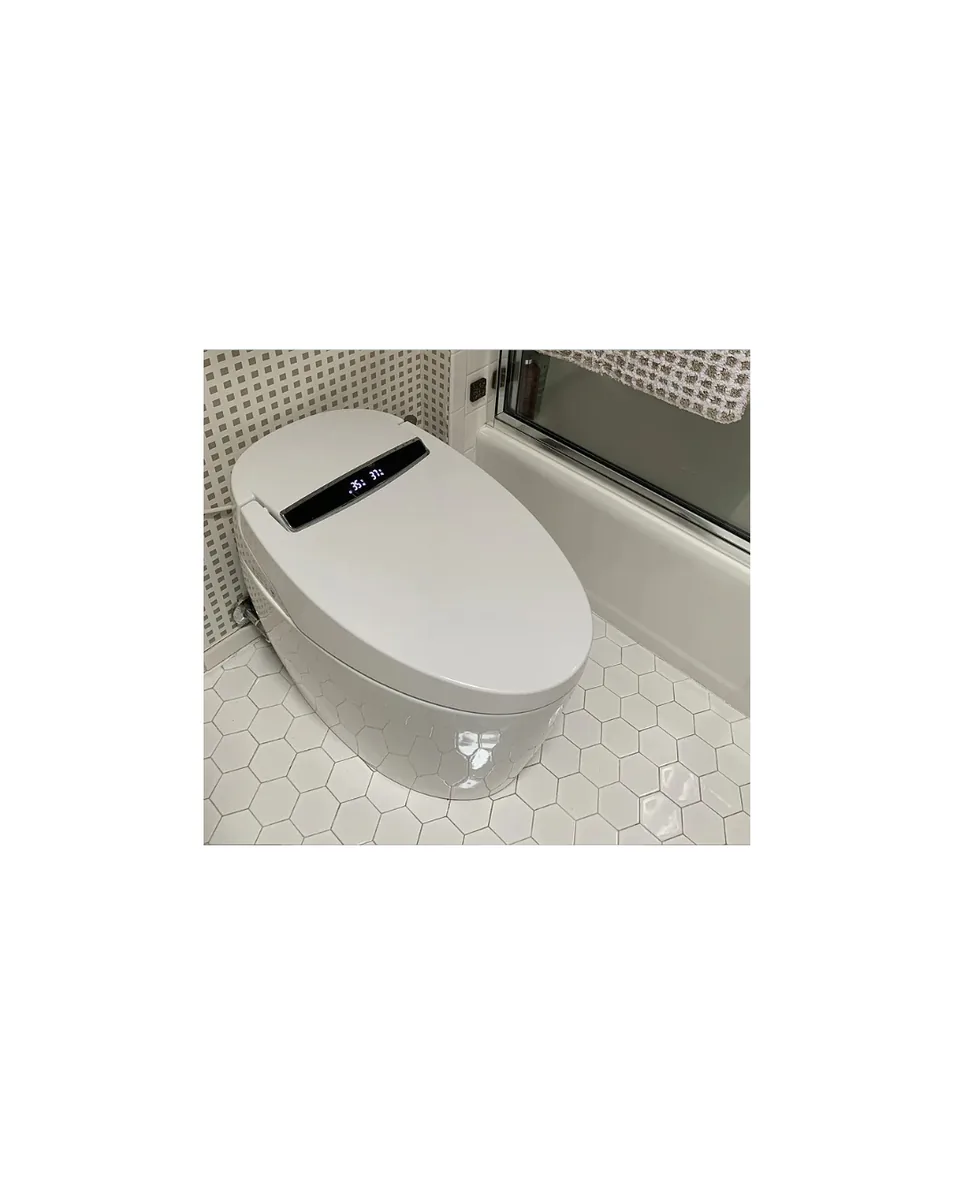 FlowLux smart toilet — hex-tile bathroom