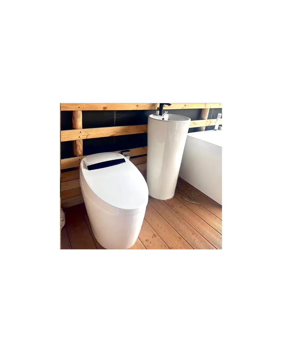 FlowLux smart toilet — night-light blue glow